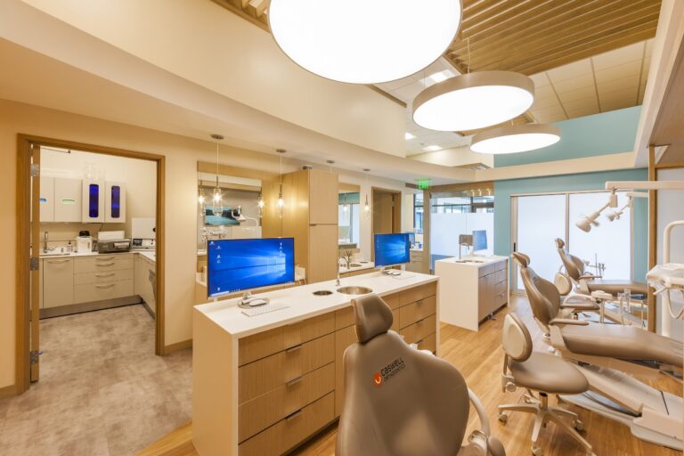 Modern orthodontic office interior with treatment chairs