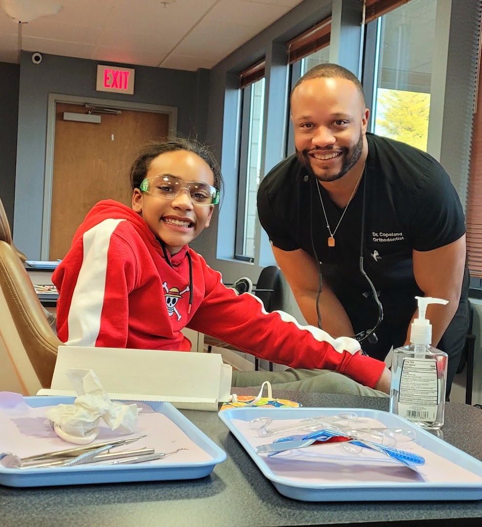 Dr. Garrison Copeland with a young patient