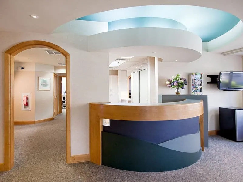 Curved reception desk at Robison Orthodontics