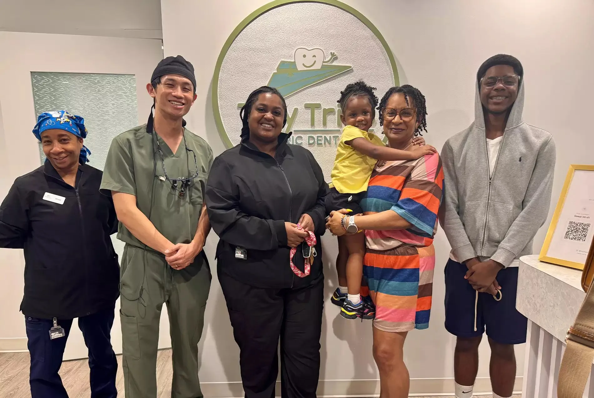 The Tiny Trips team with a patient family