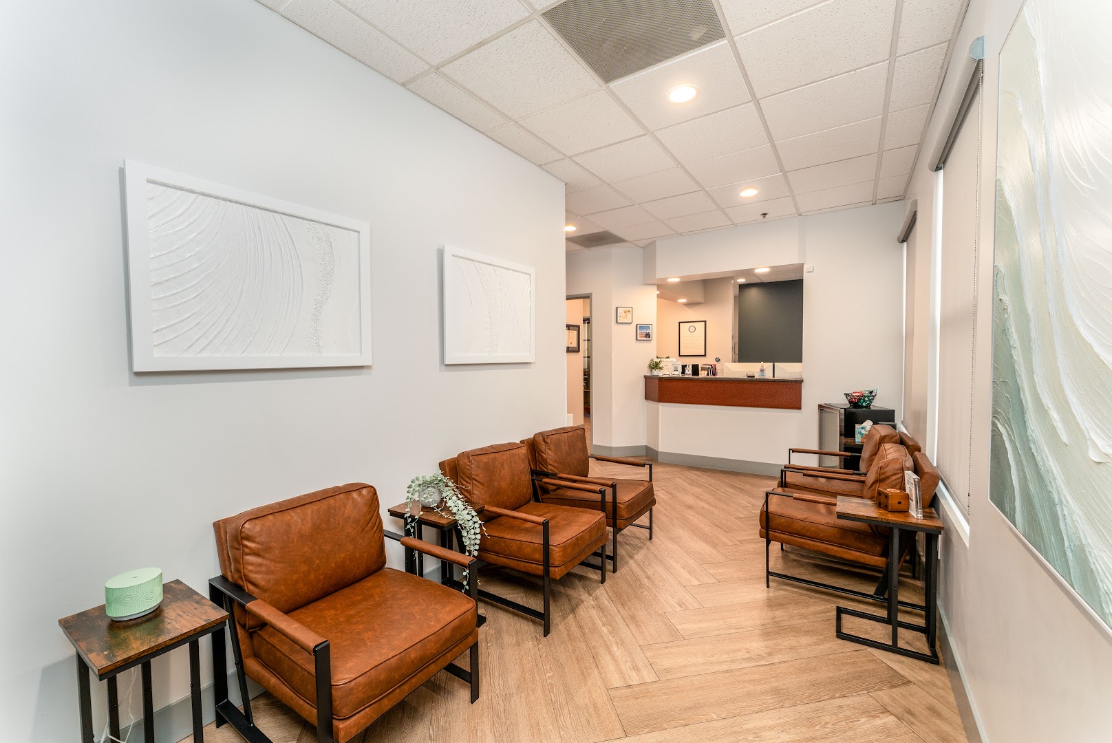 Coastal Endodontic Studio waiting room with modern seating